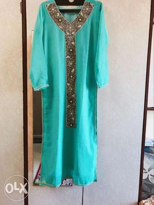 Sea green colour kurti with antique diamond wrk