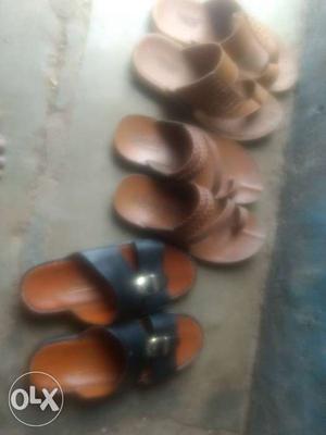 Three Pairs Of Leather Slide Sandals