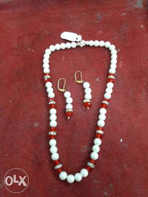 White And Red Beaded Necklace And Pair Of Earrings