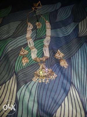 Women's White And Gold Pendant Necklace And Pair Of Dangling
