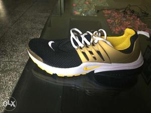 Black And Gold Nike Running Shoes