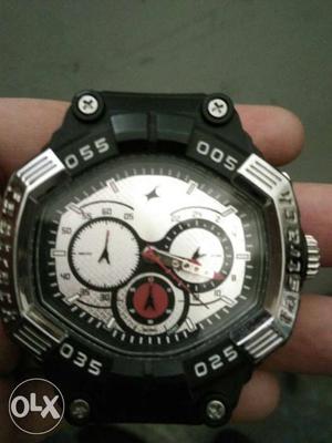 Fastrack chronograph watch with bill.