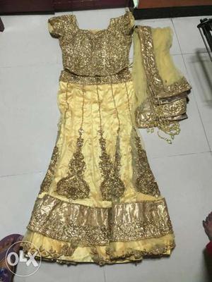 Golden lehenga originally price .