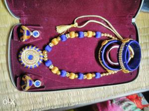 Hand made blue n golden stone necklace set..