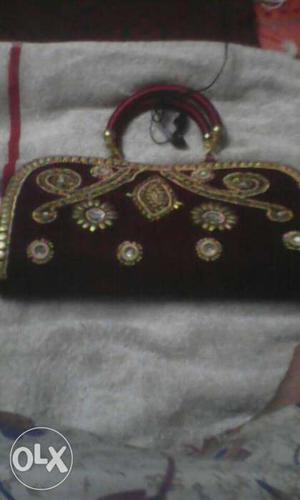 Newly lady purse. with full work maroon colour