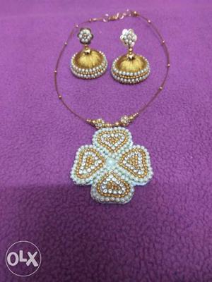 Pair Of Gold-and-white Jhumka Earrings With Necklace