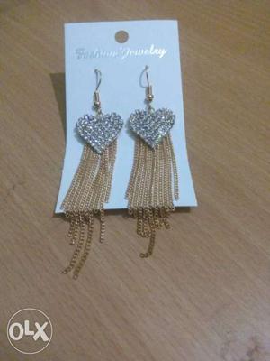 Pair Of Silver And Gold Fashion Jewelry Dangling Earrings
