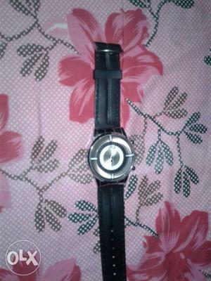 Round Silver Bezel Watch With Black Leather Strap