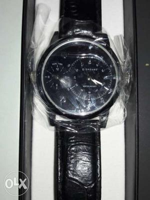 Silver And Black Round Chronograph Watch With Black Leather
