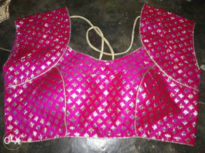 Thi blouse is desigined by a bollywood desiginer