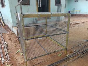 Yellow And Gray Metal Pet Cage
