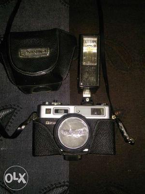 Black And Gray Vintage Camera With Bag a small problem on