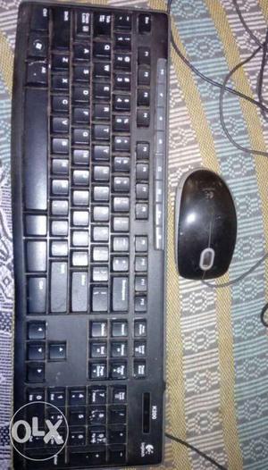 Black Logitech Corded Computer Keyboard With Gaming Mouse