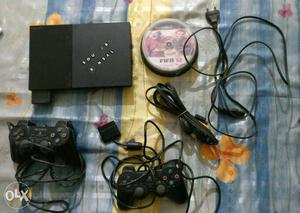Black Sony Playstation 2 With 2 Controller And With 20 cd