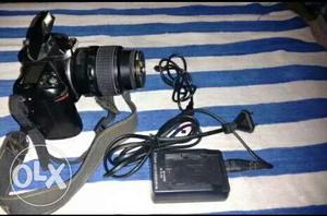Blacl nikkon DSLR camera in good condition with