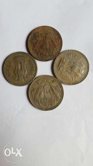 Four Brown And Silver Coins