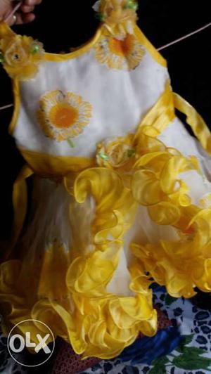 Frilled yellow dress for 0-3 year old