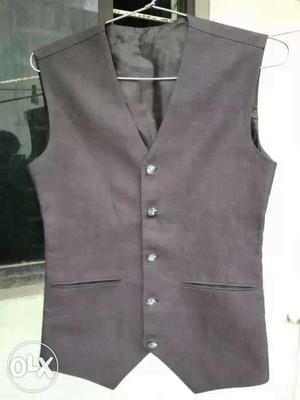 Grey Vest In Vijayapura