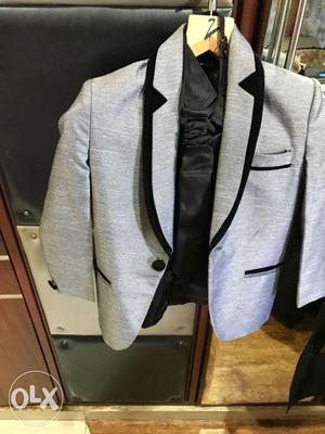 Grey coat with grey pant n black tie comfortable