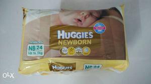 Huggies new born diapers. 2 new unopened packets.