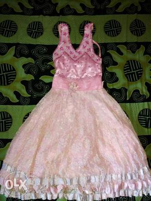 It's a cute pink princess dress in good condition