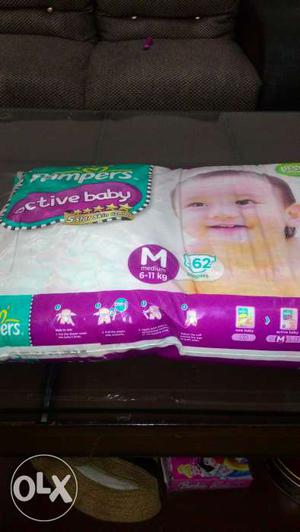 New unused Pampers active baby 62 diapers size M