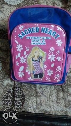 Pink colour bag. generally used as School bag