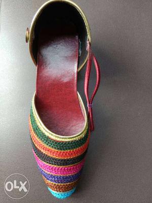 Red, Green, And Pink Knit Shoe
