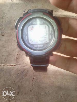 Silver Round Case Digital Watch With Black Strap