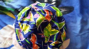 Swimming Suit with cap in good condition for