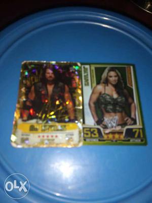 Two WWE Collectible Cards