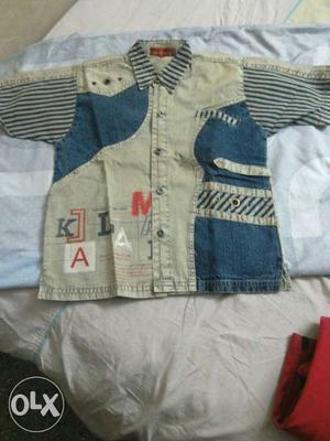 Unused shirt of size 30 for kids up to age 10, to