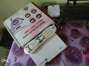 White Tv Box With Remote And Box