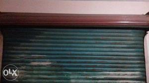 Green And Black Roller Shutter new condition heavy & strong