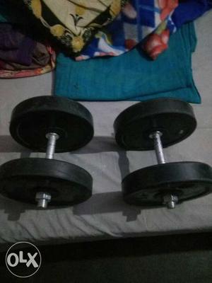 Pair Of Black And Silver Dumbbells