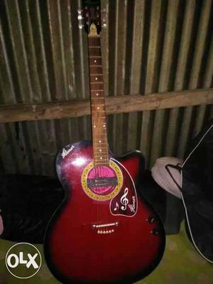 Red and black acoustic guitar hobnar urgent sell
