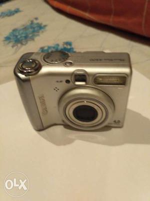 Silver Canon Point And Shoot Camera