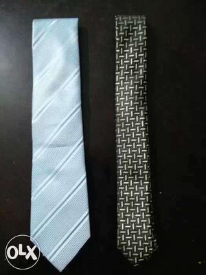 Two Blue And Black Neckties