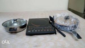 Unused Bajaj Induction cooker with its utensils