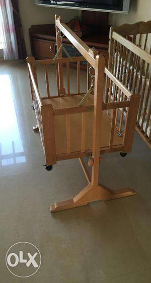 Almost New Baby Cot with Swing for Rs  only.