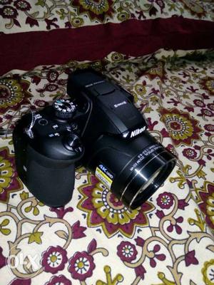 Black Nikon Bx zoom camera