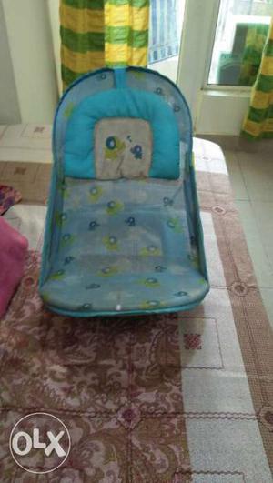 Blue bathing chair, very comfortable hardly use