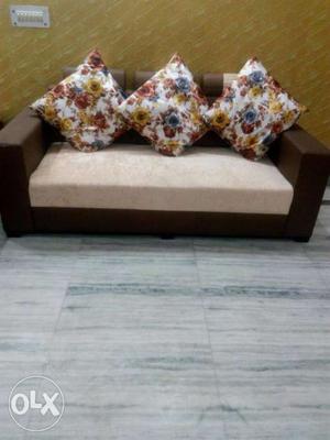 Brown Linen Sofa With Floral Throw Pillows new sofa