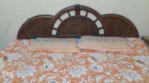 Brown Wooden Headboard; Yellow And White Floral Sheet Set