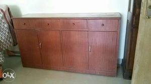 Brown colour polished wooden sideboard cabinet