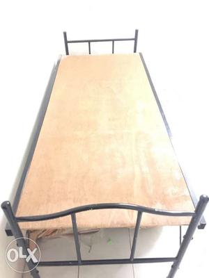 Cot with iron frame. Good condition