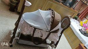 Cradle in Excellent condition with swing option n mosquito