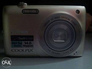 Grey Nikon Coolpix Point And Shoot Camera