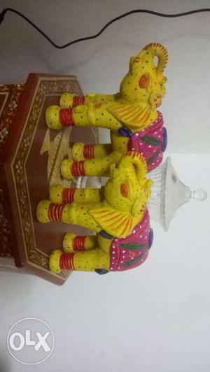 Hand made pottery coloured elephant for