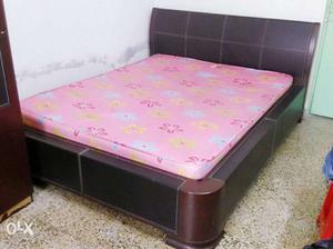 King Size Bed with matress and side Tables for sale.